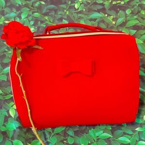 Red Estee Lauder makeup purse